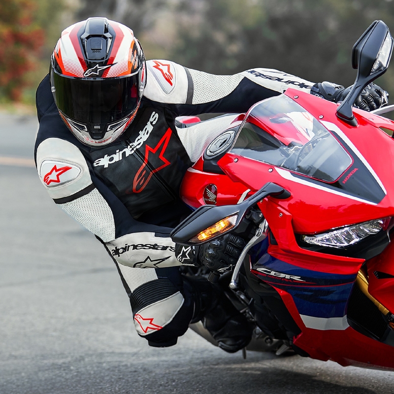 Alpinestars GP Force Lurv fluo κόκκινο-λευκό-μαύρο μονοκόμματο δερμάτινο κοστούμι μοτοσικλέτας