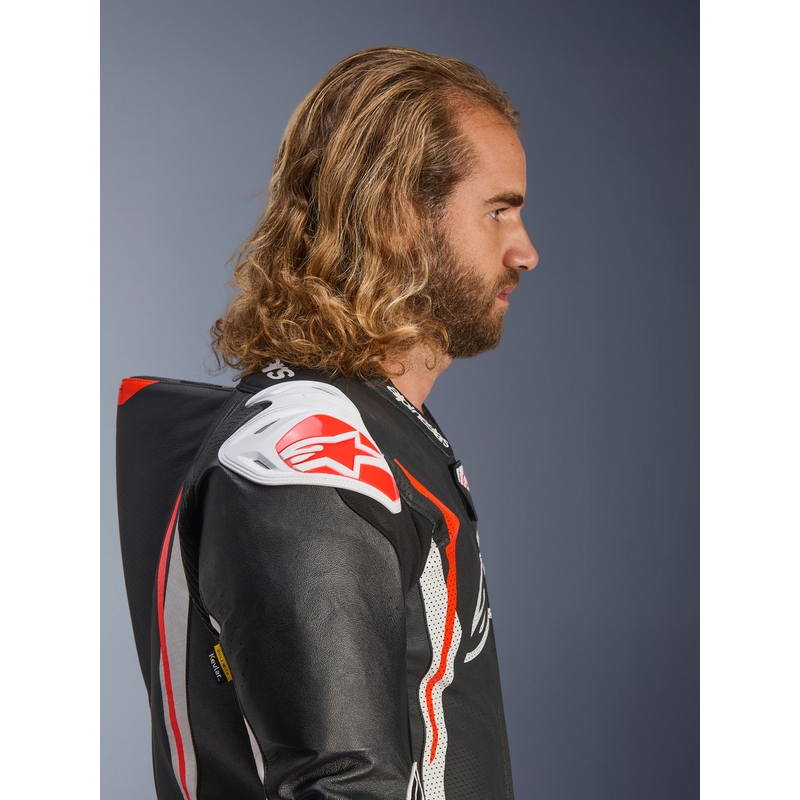 Ολόσωμη δερμάτινη φόρμα μοτοσικλέτας Alpinestars GP TECH V5 σε μαύρο-λευκό-φλουορ κόκκινο